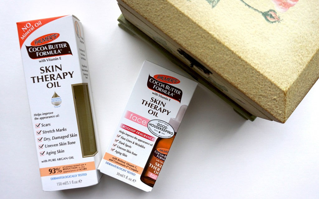 Palmer’s Cocoa Butter Oil, regular and face versions, with decorative box.
