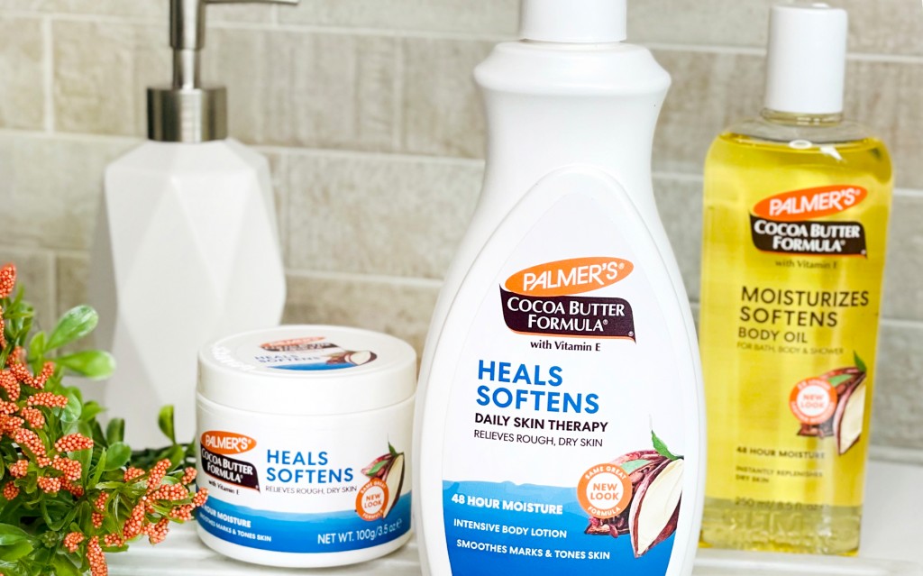 Palmer's Cocoa Butter Formula products for your extreme cold weather skin care routine on a vanity