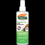 Coconut Oil Curl Refresher spray bottle for revitalizing and hydrating curls.