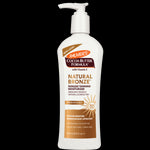 Palmer's Cocoa Butter Formula Natural Bronze sunless tanning moisturizer bottle on a white background