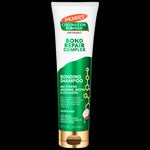Palmer’s Bond Repair Complex Shampoo tube with coconut graphic.