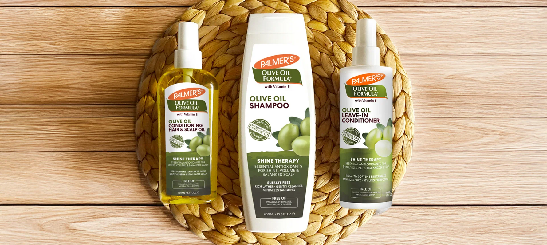 Palmer's Olive Oil Formula Hair Care products on woven mat on wooden table
