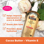 Cocoa Butter Skin Therapy Oil Rosehip with Vitamin E with pink roses.