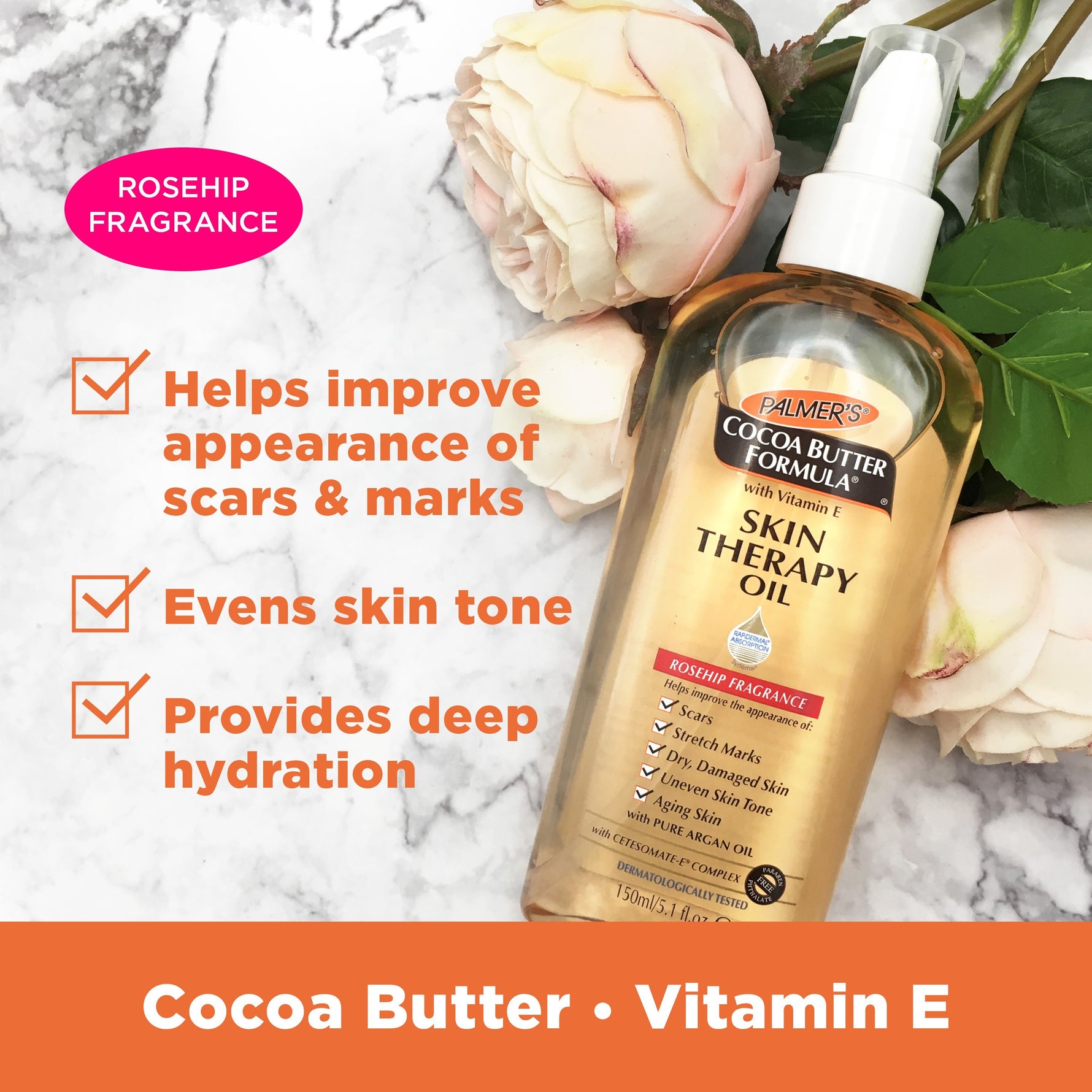 Cocoa Butter Skin Therapy Oil Rosehip with Vitamin E with pink roses.