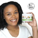 Woman holding Palmer’s Moisture Boost Deep Conditioner, 5 Minute Results shown.