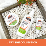 Nursing Butter Nipple Cream with cocoa butter on a pebble-filled tray.