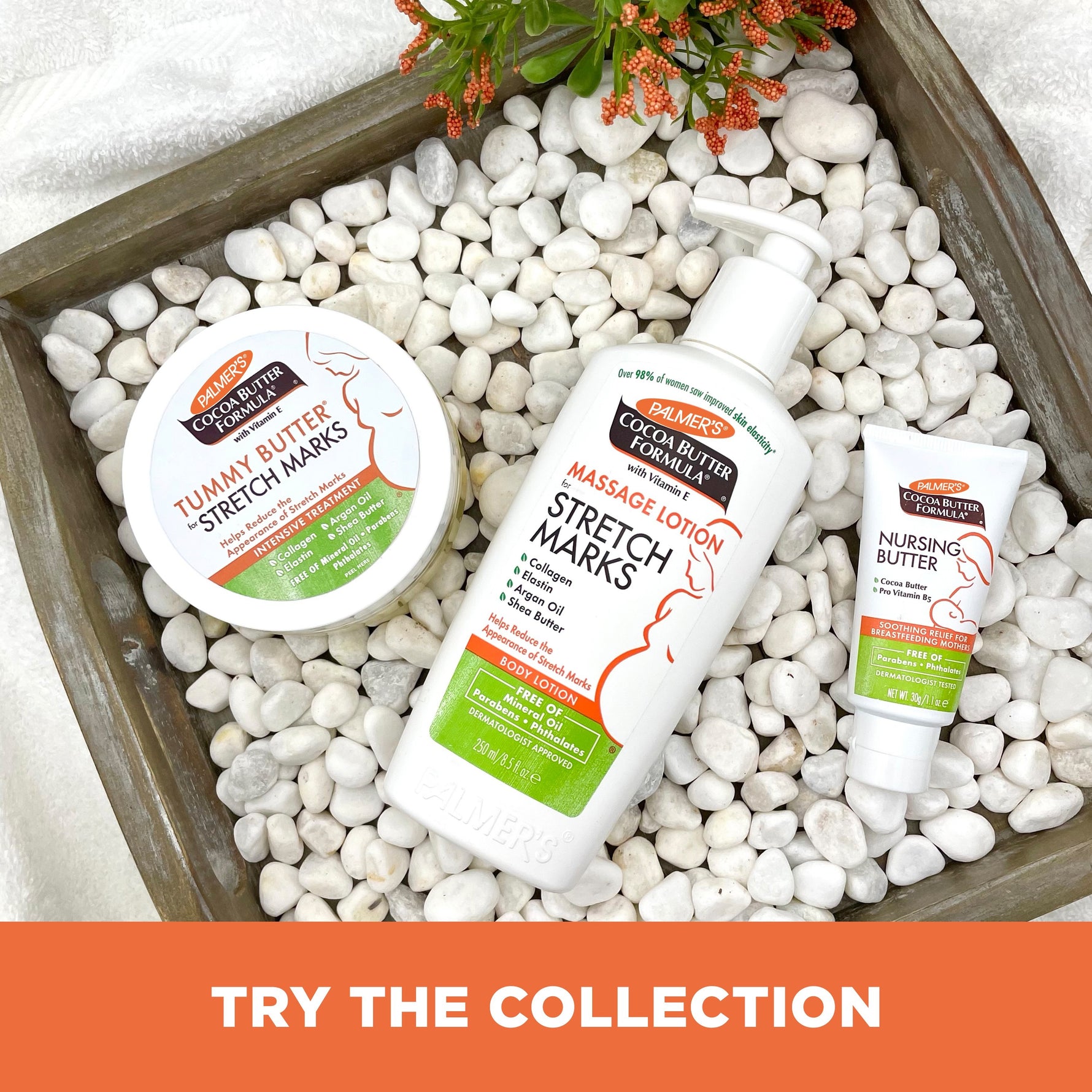 Nursing Butter Nipple Cream with cocoa butter on a pebble-filled tray.