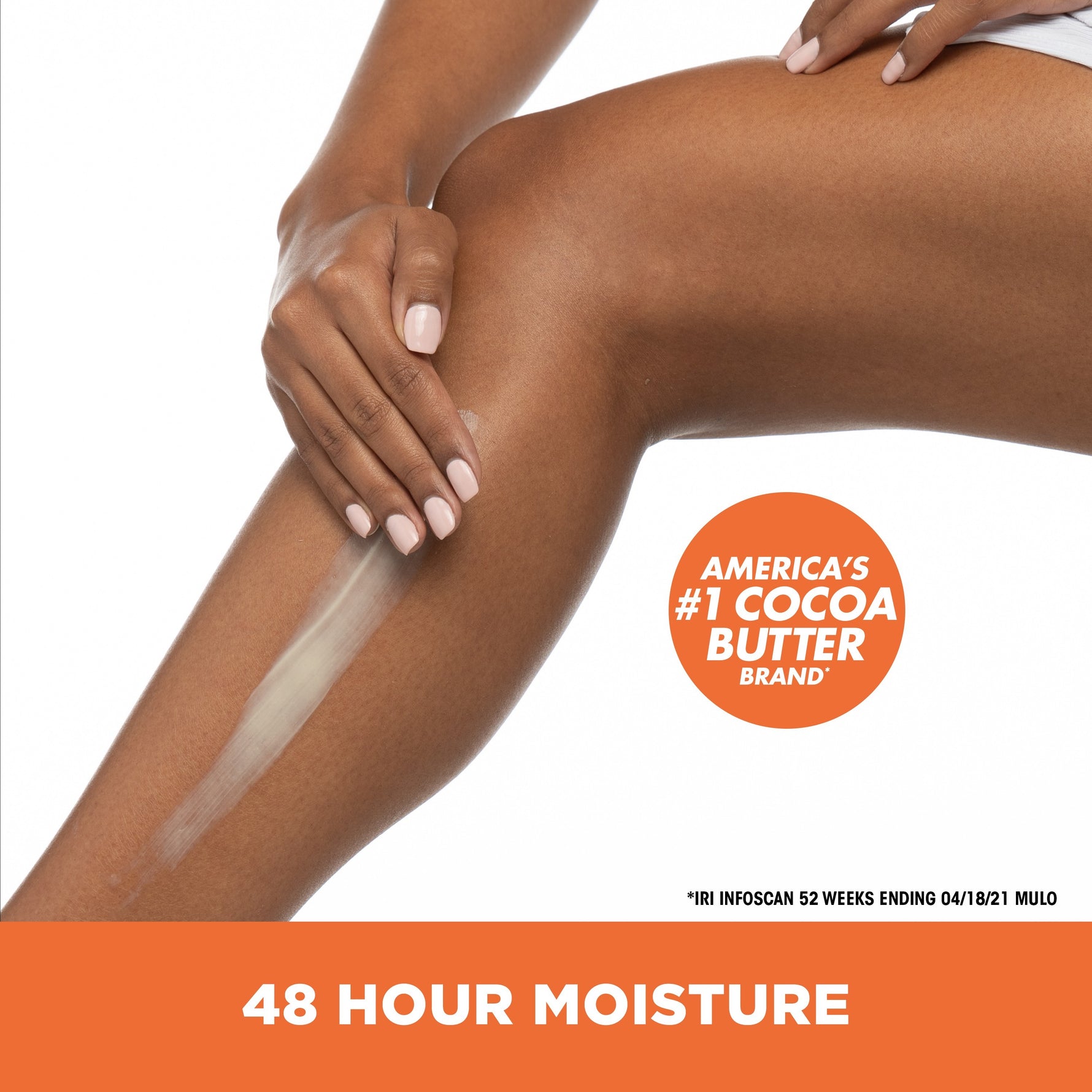 Applying Palmer's Daily Skin Therapy Cocoa Butter Body Lotion.
