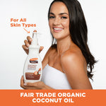 Woman holding Palmer’s Coconut Hydrate Body Lotion, promotes all skin types.
