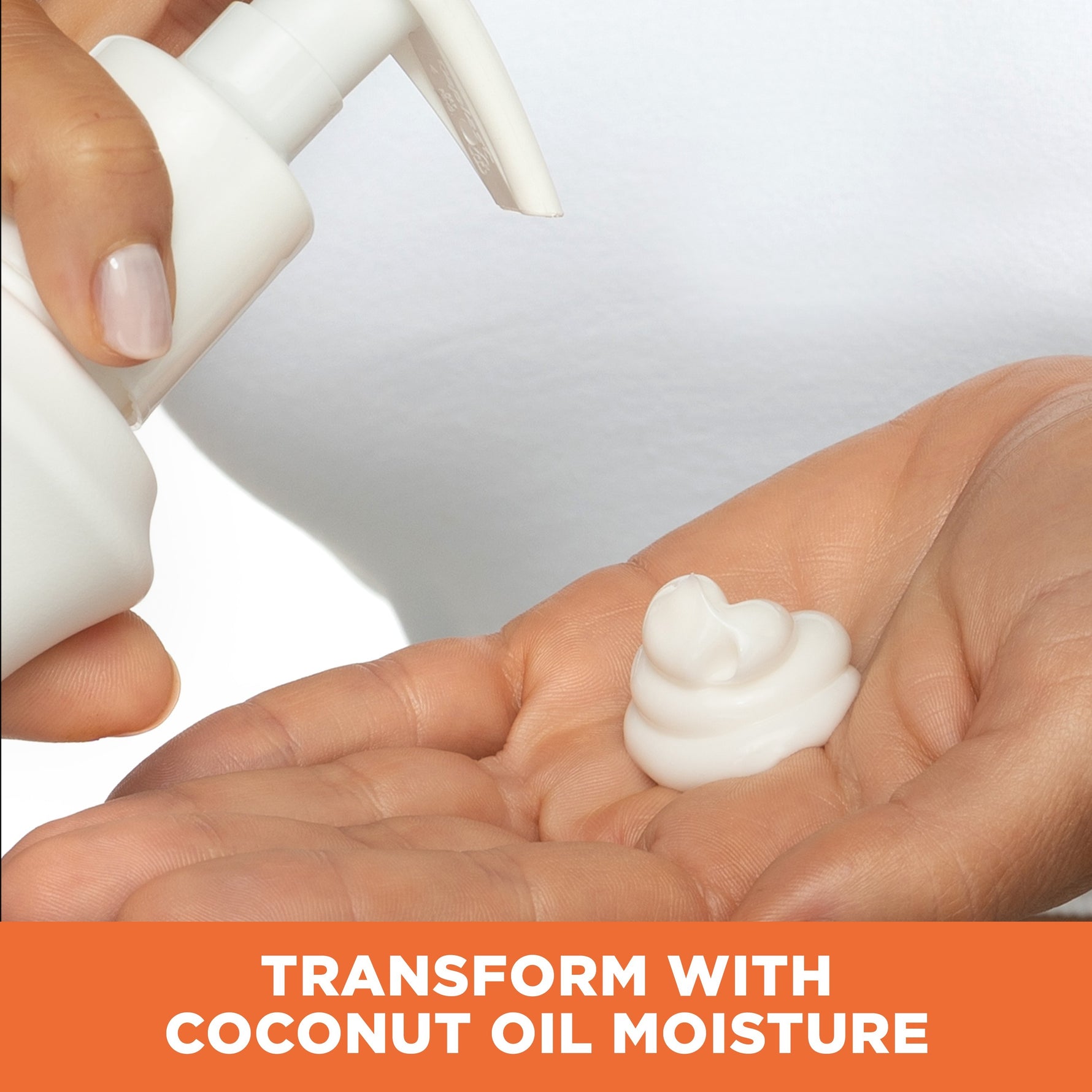 Hand dispensing Coconut Hydrate Body Lotion from pump.