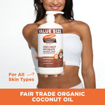 Holding Palmer's Coconut Hydrate Body Lotion bottle, label facing forward.