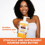 Model with Palmer's Raw Shea Nourish Body Lotion, soothing sensitive skin.