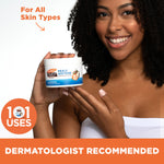 Woman holding Palmer's Cocoa Butter Original Solid Jar, Heals & Softens.