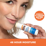 Woman applying Palmer’s Cocoa Butter Swivel Stick to lips.
