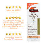 Cocoa Butter Skin Therapy Oil with Vitamin E packaging and testimonials.
