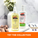 Cocoa Butter Skin Therapy Oil and Stretch Marks Lotion with decor.