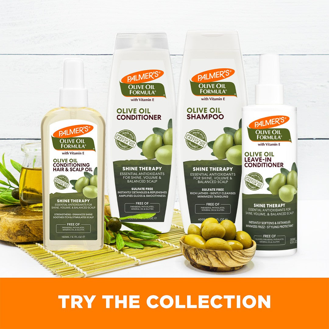 Palmer's Olive Oil Leave-In Conditioner amid haircare collection and fresh olives.