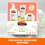 Complete Pregnancy Stretch Mark Care Kit beside a white orchid blossom.