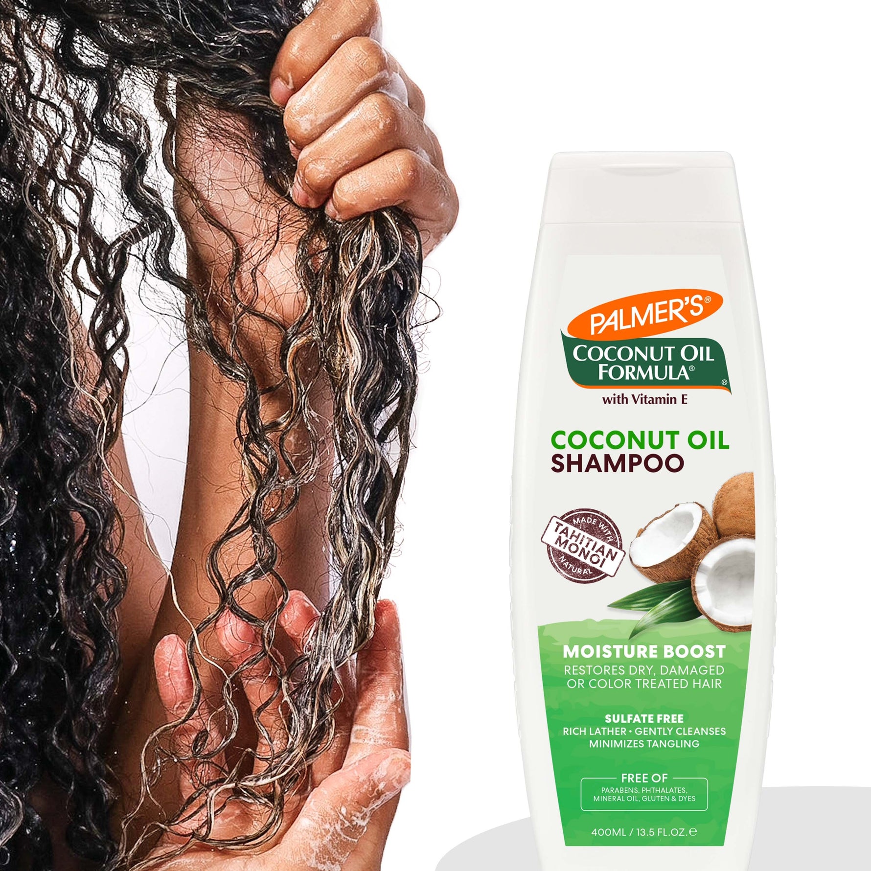 Coconut Oil Shampoo in use, boosting moisture on curly hair.