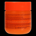 Black & Beautiful® Carrot Gro hair treatment jar with application instructions.