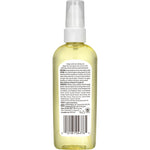 Massage Oil for Stretch Marks in clear pump bottle.