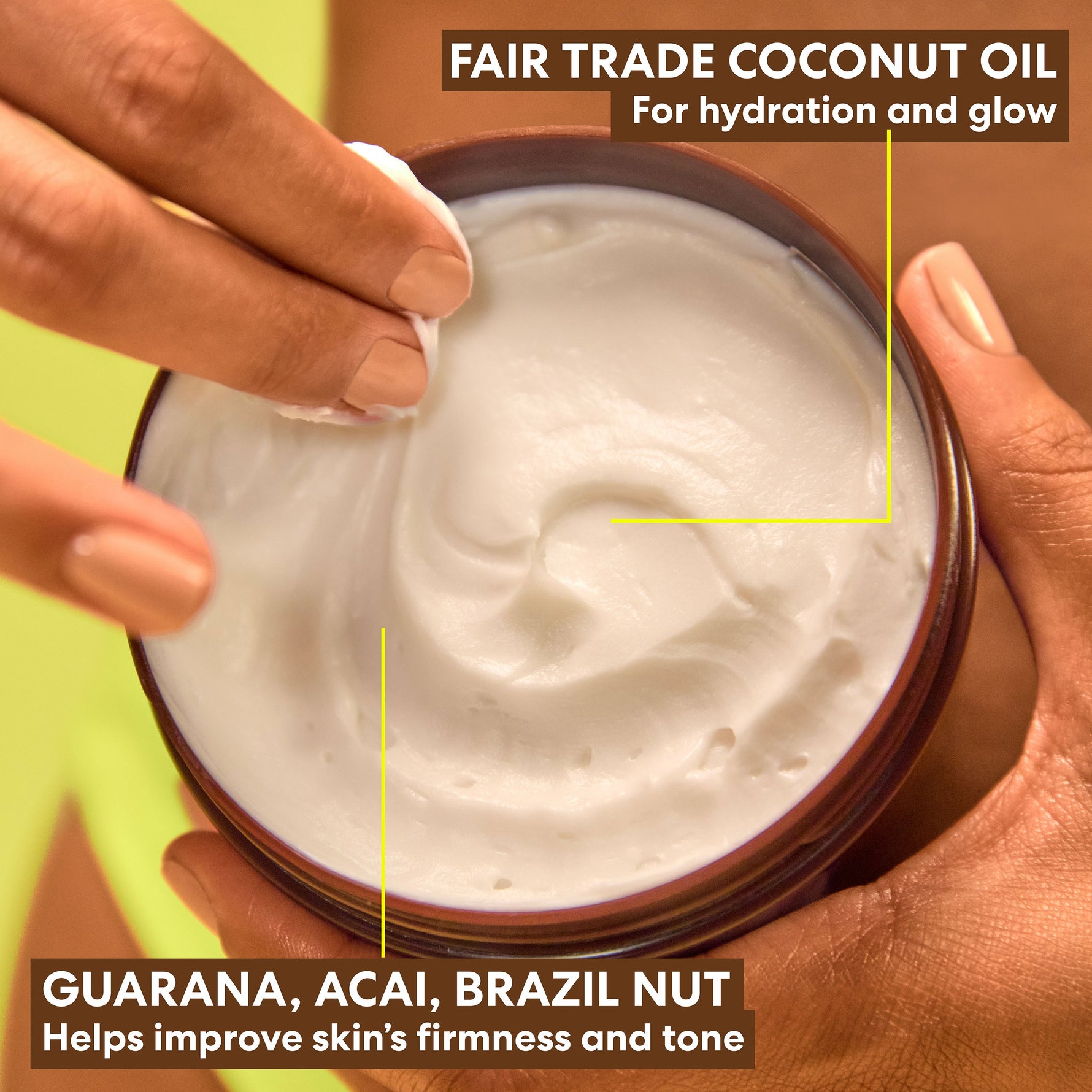 Brazilian Coco Whipped Bum, Bust & Body Cream in hand.