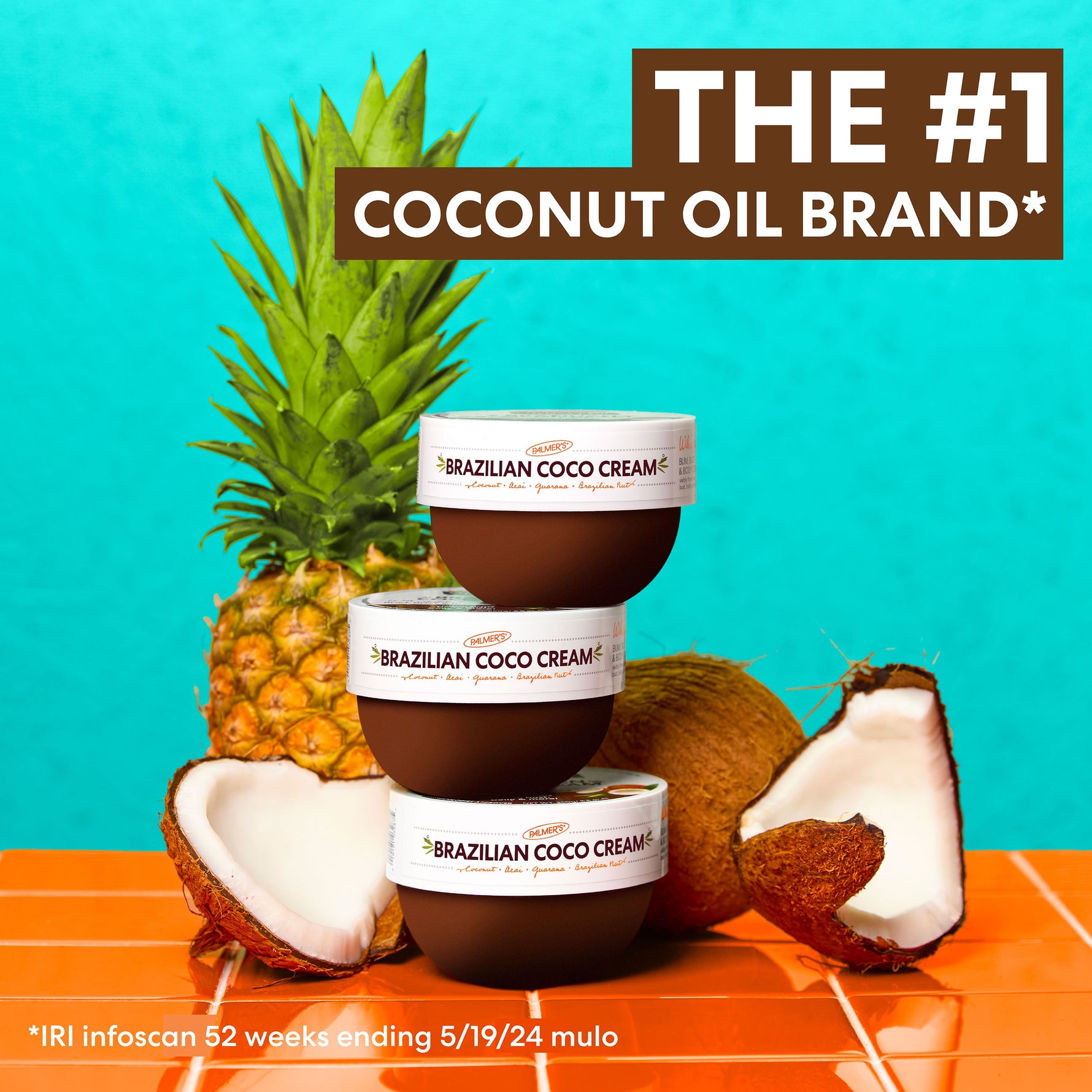 Palmer’s Brazilian Coco Cream tubs with coconut and pineapple background.