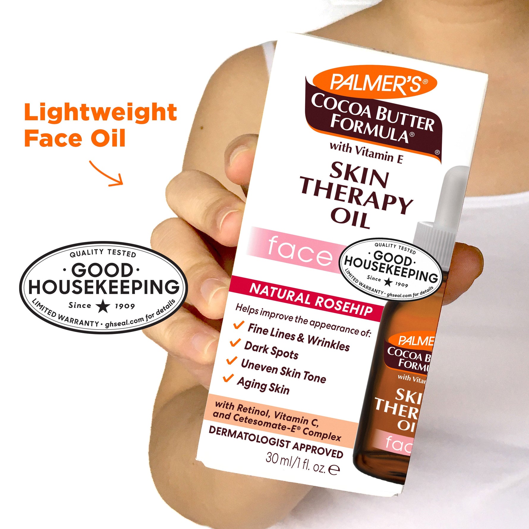 Palmer’s Skin Therapy Face Oil box held in hand.