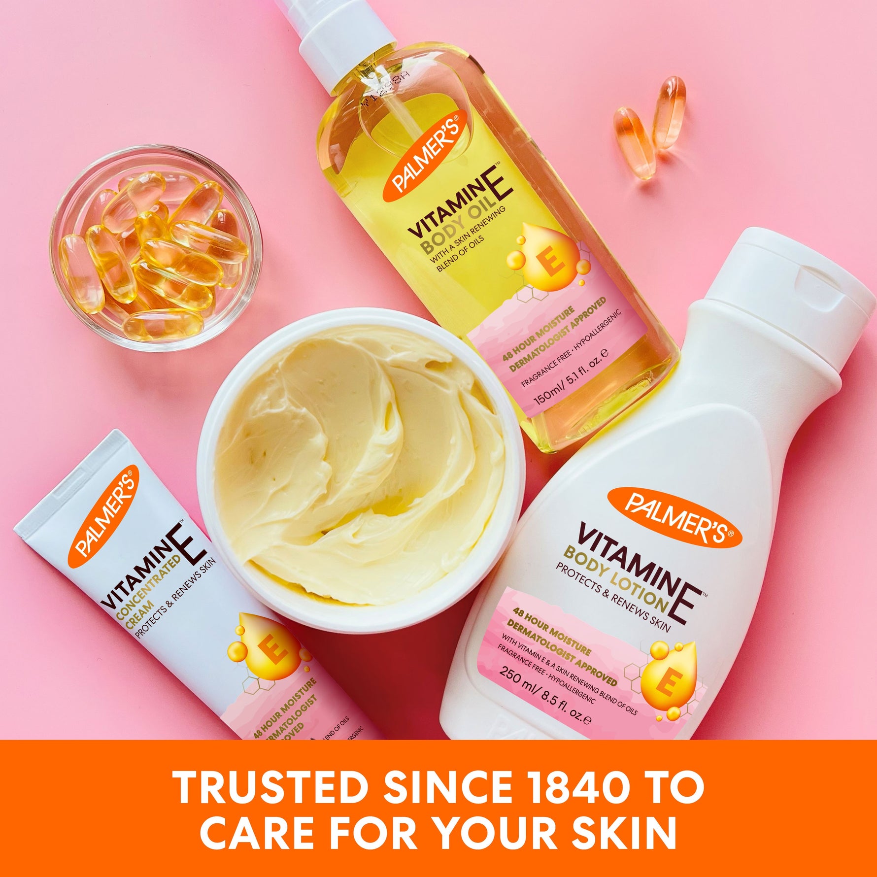 Palmer's Vitamin E Body Lotion with skincare range flat lay.
