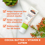 Cocoa Butter Massage Cream tube with benefits and plant accents.