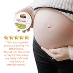 Pregnant belly with Palmer's Cocoa Butter Tummy Butter for Stretch Marks.
