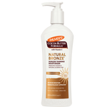Palmer's Cocoa Butter Formula Natural Bronze sunless tanning moisturizer bottle on a white background