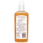 Orange bottle of Palmer's body oil with label on a white background