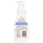 White bottle with pump and label on a white background