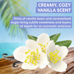Vanilla flowers with a vanilla bean on a wooden surface, labeled 'Creamy, Cozy Vanilla Scent'.