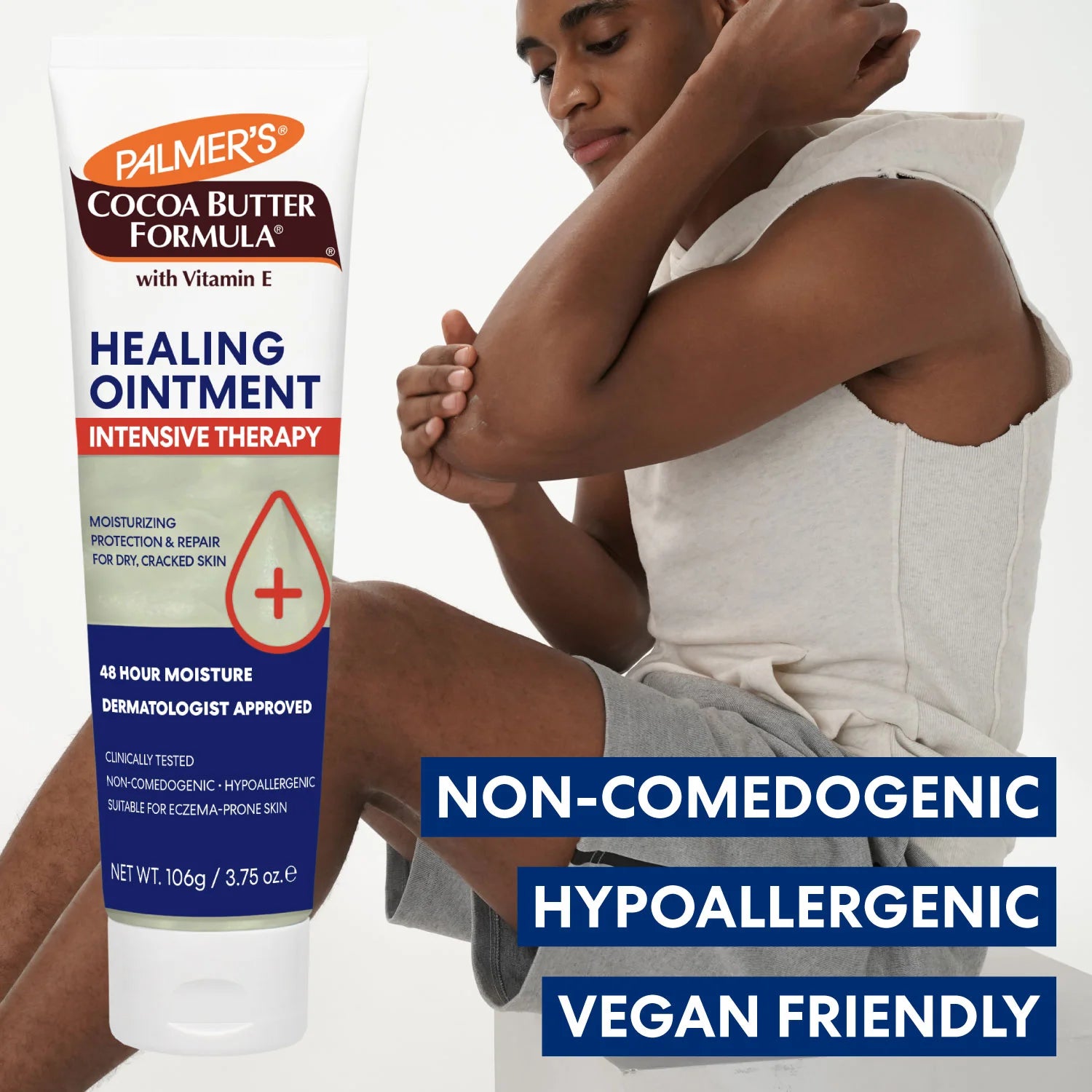 Palmer's Cocoa Butter Formula Healing Ointment with a person applying it to their arm.