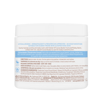 Back label of a baby balm container with text and branding.