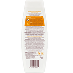Back view of a shampoo bottle with text and branding on a white background