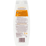 Back of a conditioner bottle with text and branding on a white background