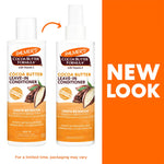 Two bottles of Palmer's Cocoa Butter Formula leave-in conditioner with an orange background and 'New Look' text.