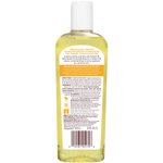 Bottle of liquid with a label on a white background