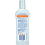 Back label of a bottle with text and a barcode on a white background