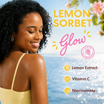 A promotional graphic for Lemon Sorbet Glow. It features a smiling woman with curly hair on the left, set against a sunny beach background with blue water and a light blue sky.