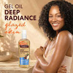 A bottle of Palmer's Deep Radiance Gel Oil is displayed next to a smiling woman with dark curly hair and glowing skin, set against a warm beige background with promotional text.