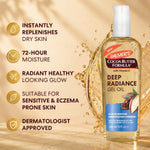 A bottle of Palmer's Cocoa Butter Formula Deep Radiance Gel Oil shown on a warm beige background with text callouts about moisturizing benefits and a splash of gel around the bottle.