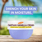 Tahitian Vanilla Moisture Drenching Whipped Body Cream on wooden surface.