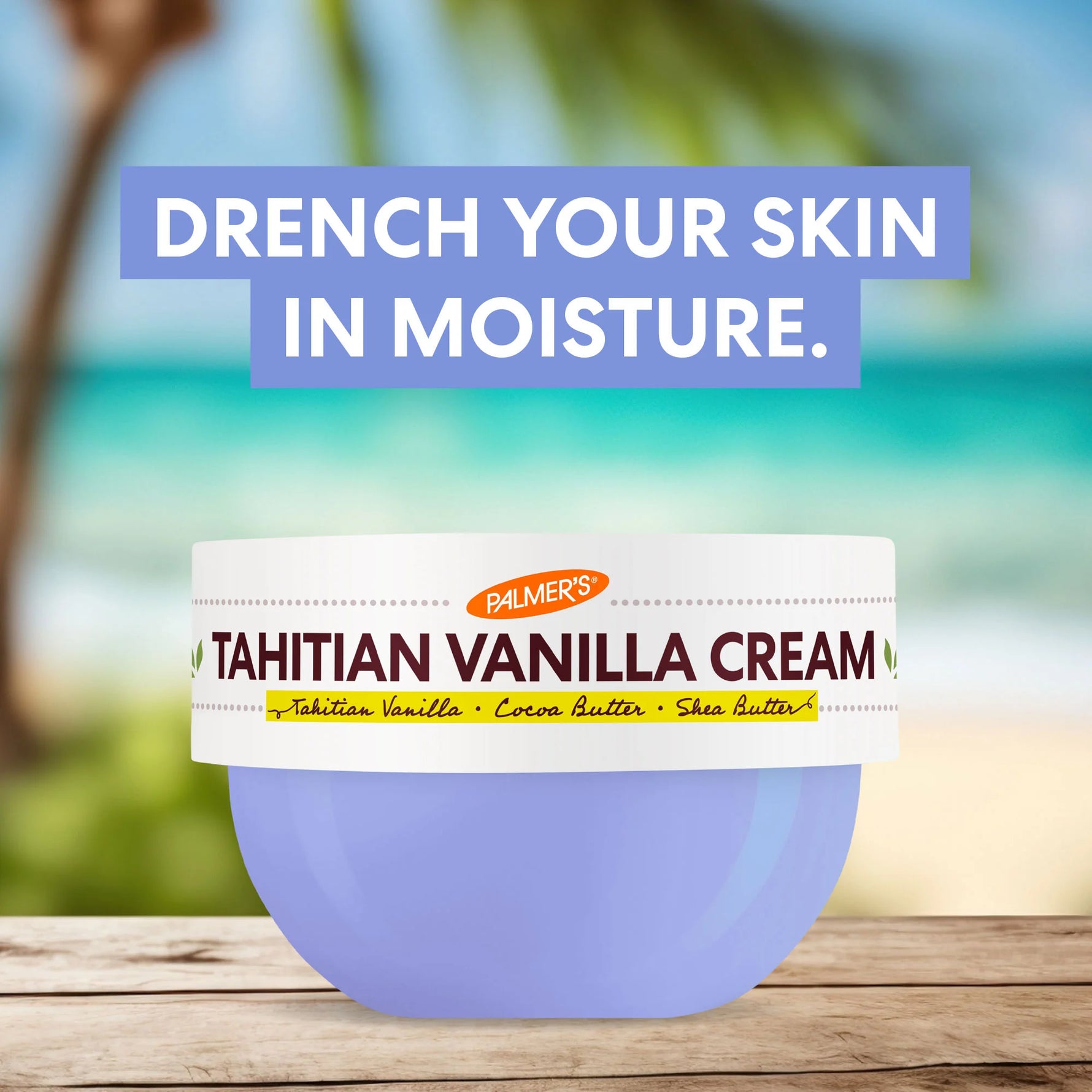 Tahitian Vanilla Moisture Drenching Whipped Body Cream on wooden surface.