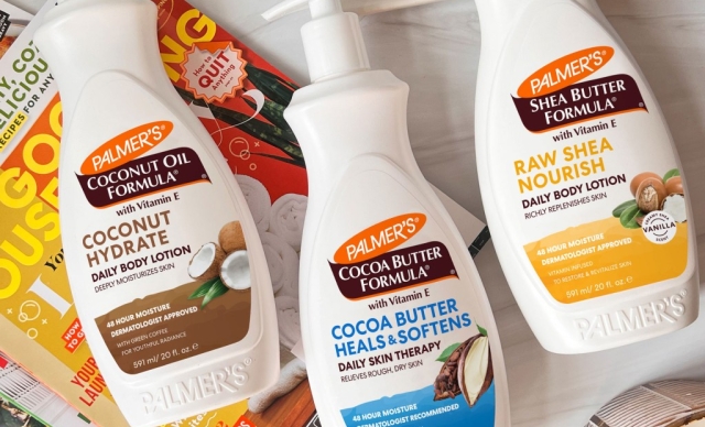 Palmer's Coconut Hydrate Lotion for dull and dry skin or Cocoa Butter and Shea Butter for eczema-prone skin on top of magazines